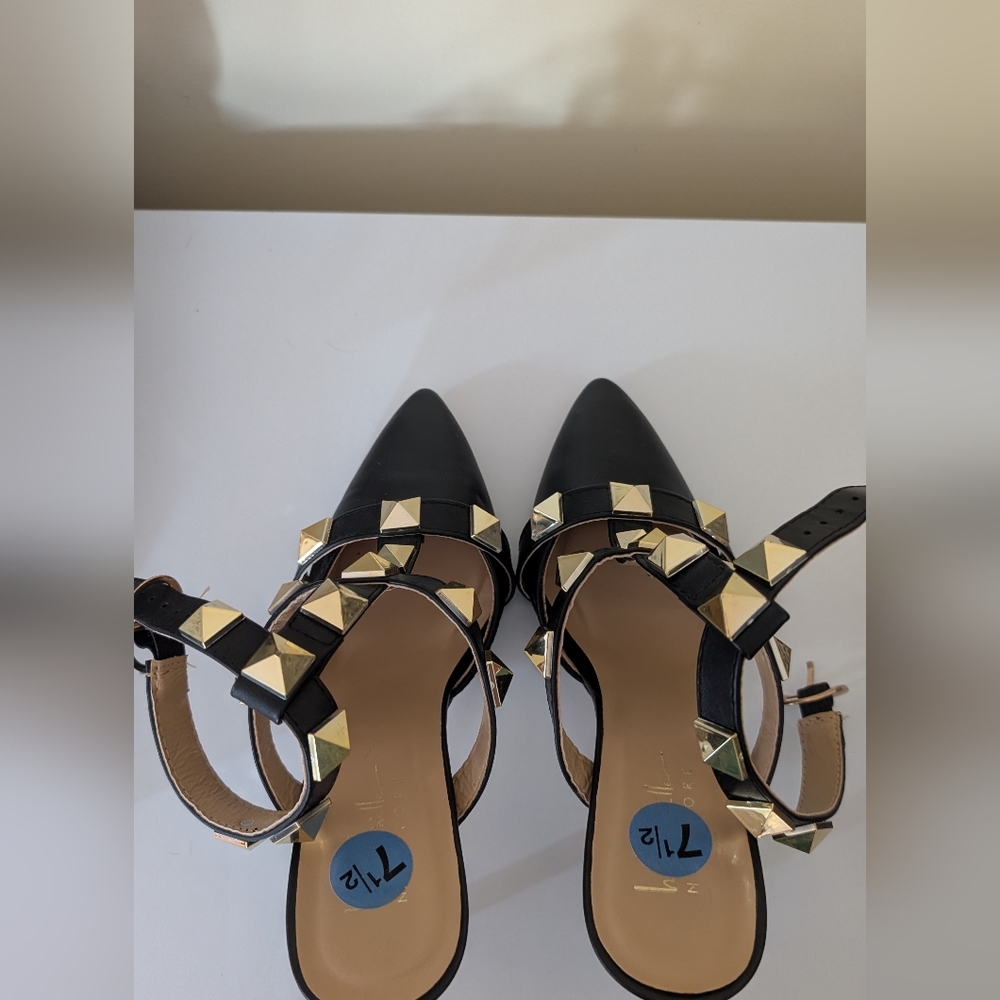 Studded pointed toe shoes